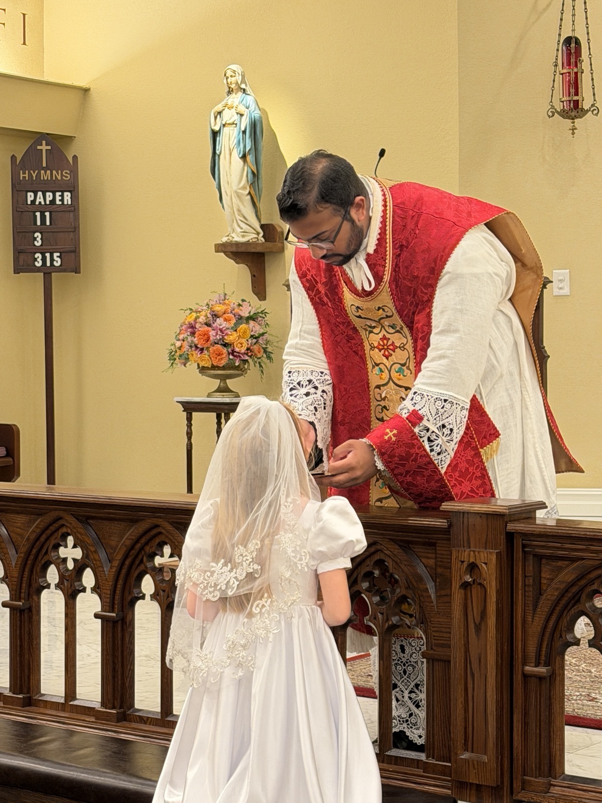 First Holy Communion at the altar rail